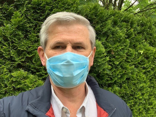 Andrew Wilkinson wears a mask in a Facebook post.