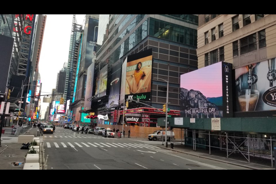 The Ƶappsign in Times Square: this photo was taken during the recent Black Lives Matter protests, where much of the city was boarded up and riot police were positioned throughout the city. The main protests were happening just behind the street you see (7th Avenue) which was barricaded off as a police muster point.