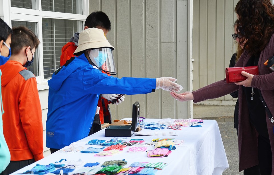 Sperling Elementary School students sell masks they made at home while in-class instruction was suspended. The proceeds of the class business project will be donated to the Vancouver Aquarium.