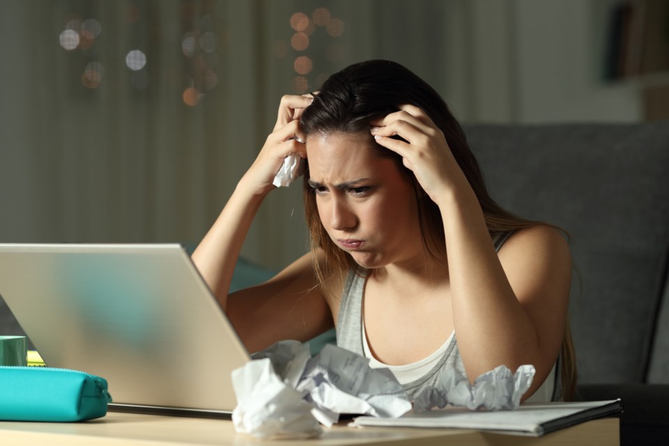 stress, student, computer, home learning, stock photo