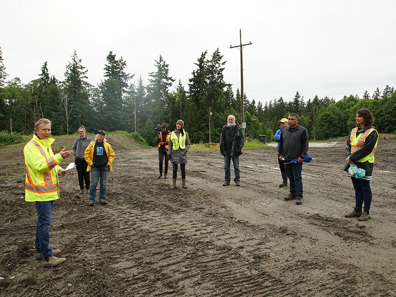 PROPERTY PREPARATION: Elected officials and senior staff members from local governments recently toured the newly cleaned up waste transfer site where the old municipal incinerator operated. This first phase of the resource-recovery project will prepare the way for closure of the landfill at the site, which will be preparation for the construction of the region’s new centre for solid waste management. Paul Galinski photo