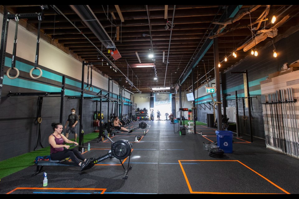 People work out at the CrossFit Lolo Gym in Victoria. The brand, which incorporates interval training, power lifting and weightlifting, was founded in 2000. Greater Victoria has at least seven CrossFit-affiliated gyms. June 2020