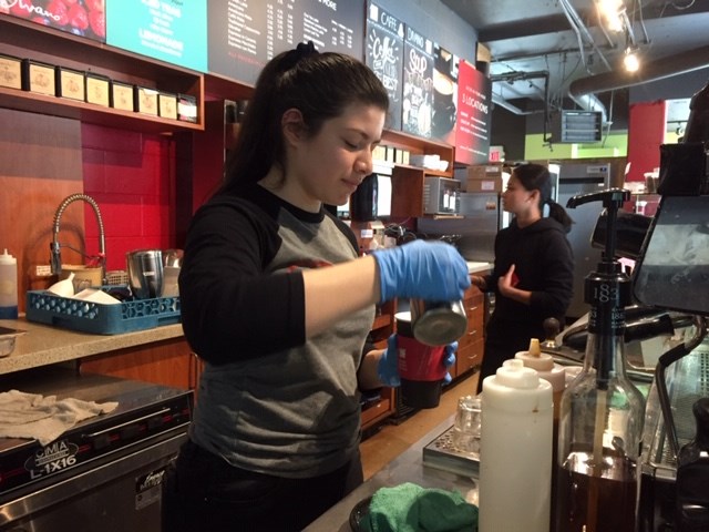 Graciela Cruz serves up coffee at Café Divano in Coquitlam.