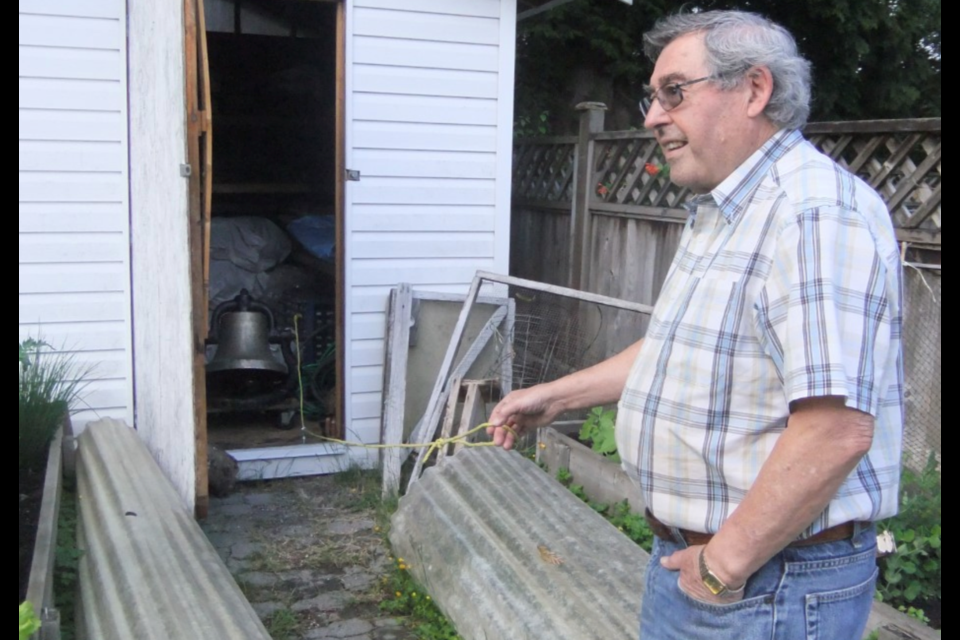 Bernie Poitras rings the bell