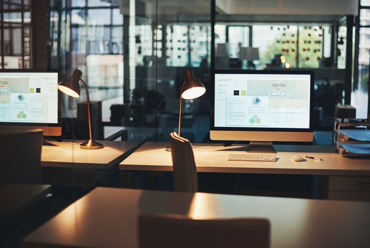 A desk in an empty office.