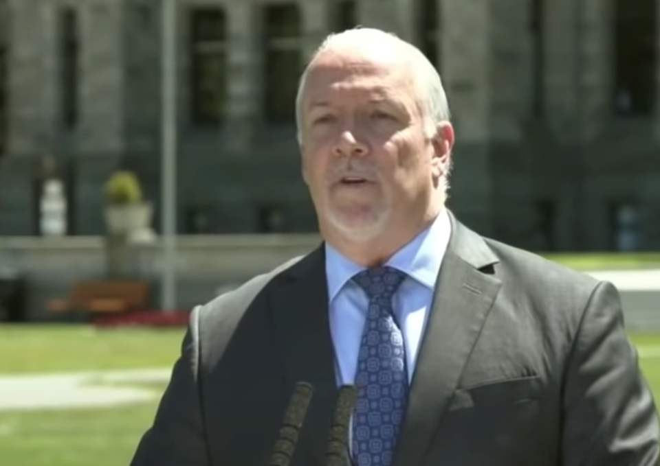 Premiere John Horgan speaks before the legislature, June 17.