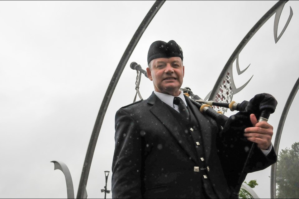 Mike Chisholm says that with the BC Highland Games and Scottish Festival cancelled due to the COVID-19 pandemic, he came out to Coquitlam's Lafarge Lake June 20 to pay tribute to one of the oldest immigrant communities in B.C.