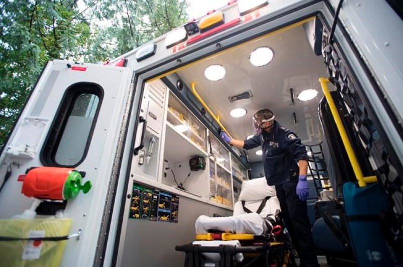 B.C. Ambulance paramedic Jeff Booton cleans his ambulance at station 233 in Lions Bay, B.C. Wednesday, April 22, 2020. Booton was among the people who cared for a COVID-19 patient.