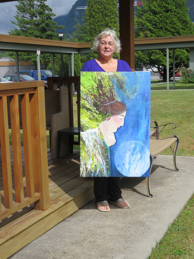 Chris Rice, with one of her pieces.
