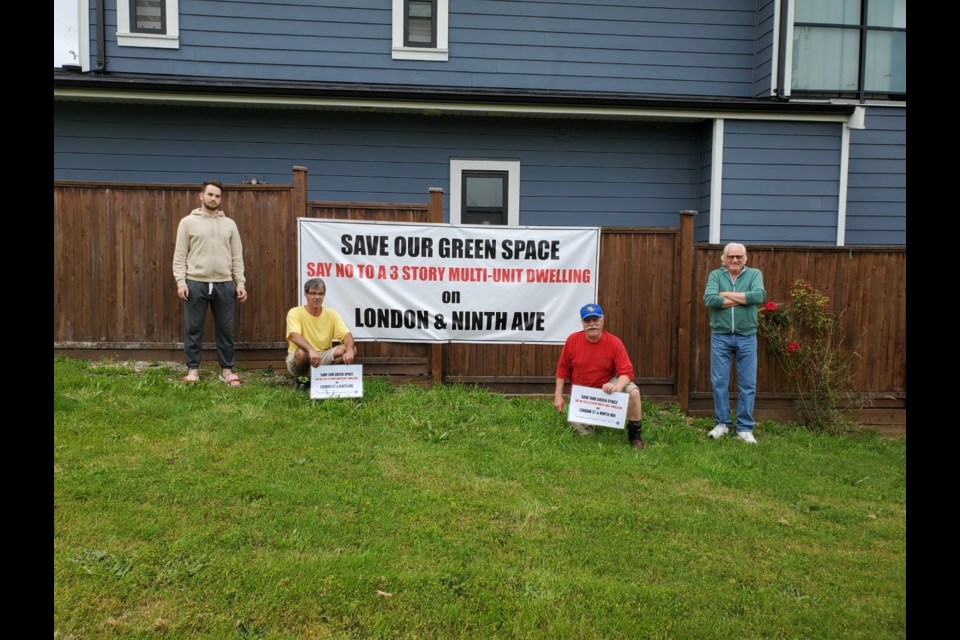 Some Connaught Heights residents are concerned that some green space in their neighbourhood is being considered for affordable housing development. Show here are area residents, from left, Kevin Kutasi, Arpad Kutasi, Bob Petrusa and Gary Hartley.