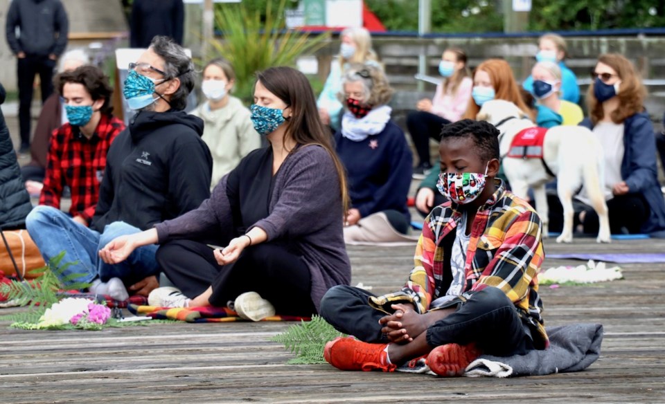 People sitting on a pier