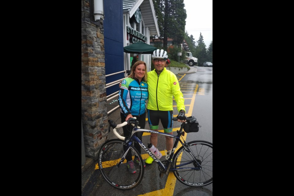 Ladner's Dave Peerless with Vicki Kunzli. Peerless kicked the fundraising and fitness challenge off with his own 400k bike ride on June 20.