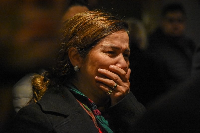 A mourner at a celebration of life for a Port Coquitlam family who was killed when a missile shot do