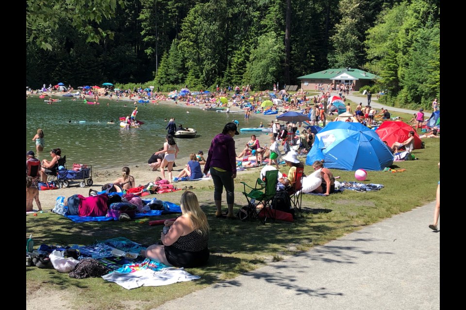 White Pine Beach on a recent sunny day. Beach-goers are urged to exercise social distancing and remain in their chosen bubbles.