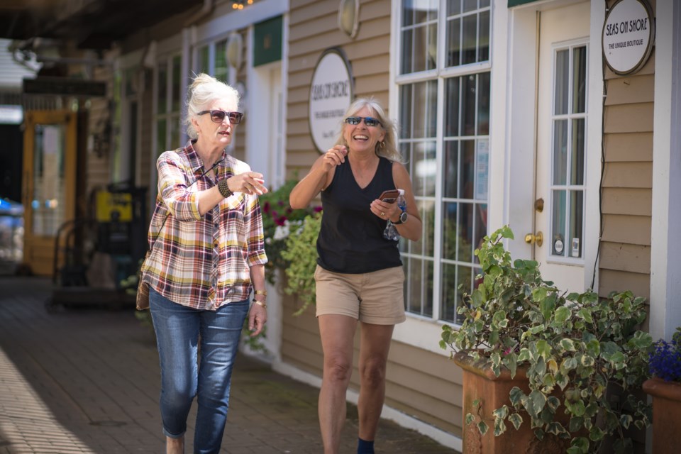 Attendees walked around the Steveston to look for clues. Photo from Mysterytowns/Adam Walker