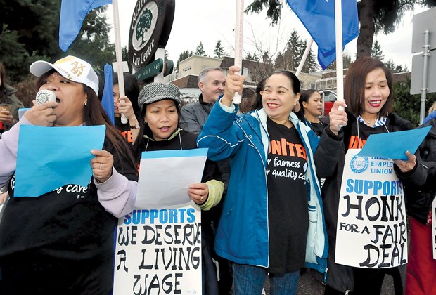 Unionized staff at Inglewood Care Centre in West Vancouver during a 2014 rally to draw attention to their lack of a contract. A Hospital Employees Union official says the facility has practiced “contract flipping” to cut labour costs