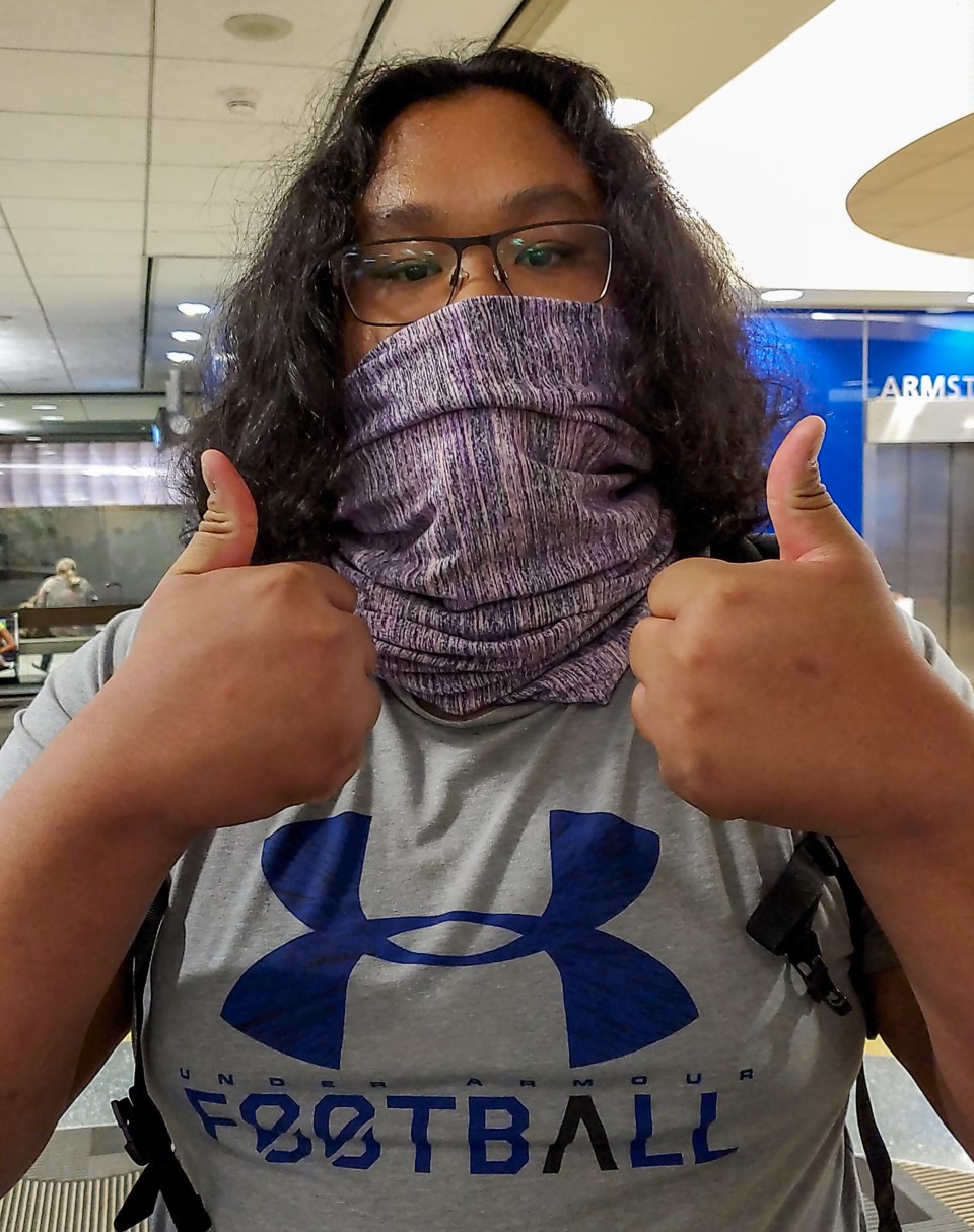 Aaron Tung in the airport on his way from Coquitlam to Florida where he is now enrolled at a local h