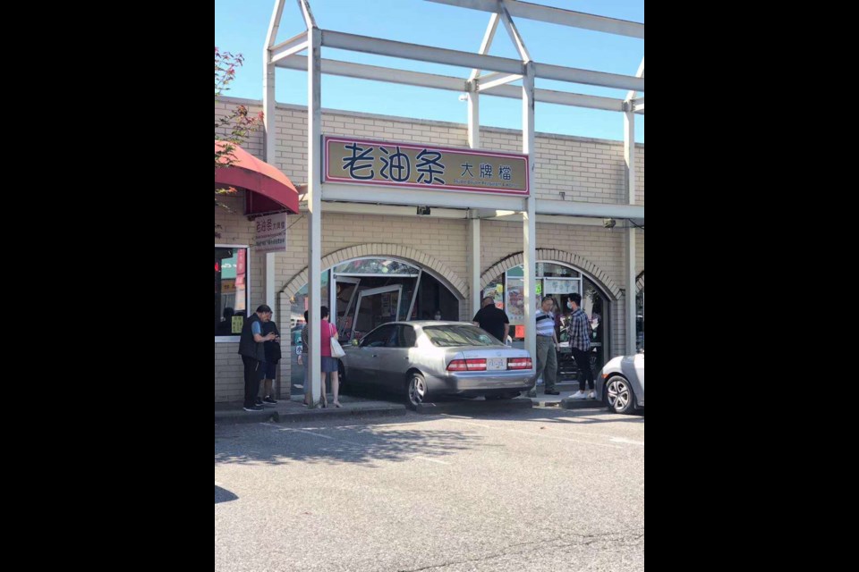 A silver vehicle crashed into a Chinese restaurant at 4600 No. 3 Road near Aberdeen Center on Saturday. Photo submitted