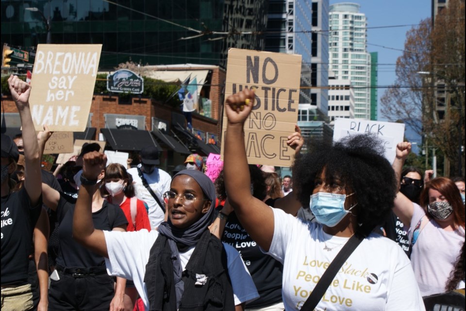 Demonstrators in Vancouver Saturday mark the anniversary of the abolition of slavery in Canada