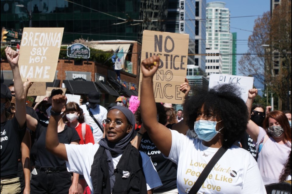 Demonstrators in Vancouver Saturday mark the anniversary of the abolition of slavery in Canada