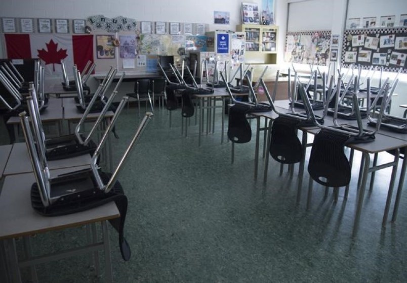 A empty classroom is pictured at Eric Hamber Secondary school in Vancouver, B.C. Monday, March 23,