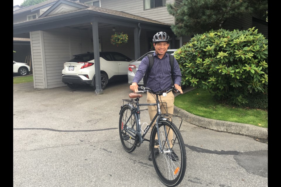Richmondite Thi Nguyen with his bike. Photo submitted