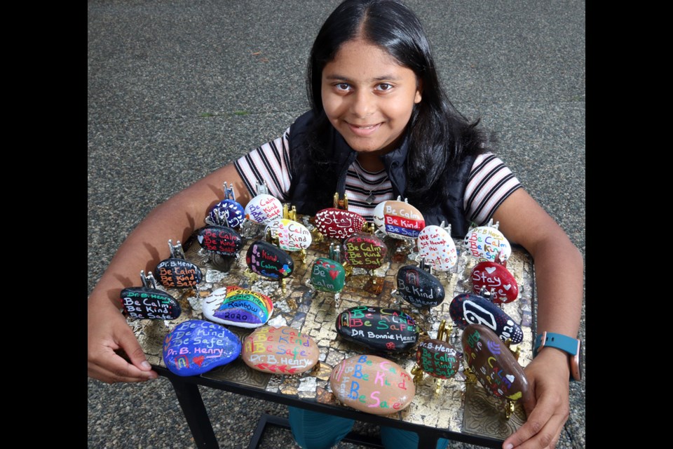 Insiyah Dharsee, 13, has embraced painting rocks with the signature message of British Columbia's medical officer, Dr. Bonnie Henry, as her way of getting through the COVID-19 pandemic.