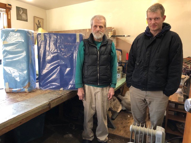 BowenIslandUpholstery’s Dave and Christian with the cushions of Behm’s art piece.