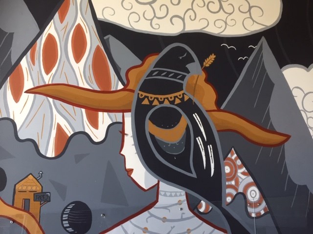 A lady and a crow in a Port Coquitlam mural