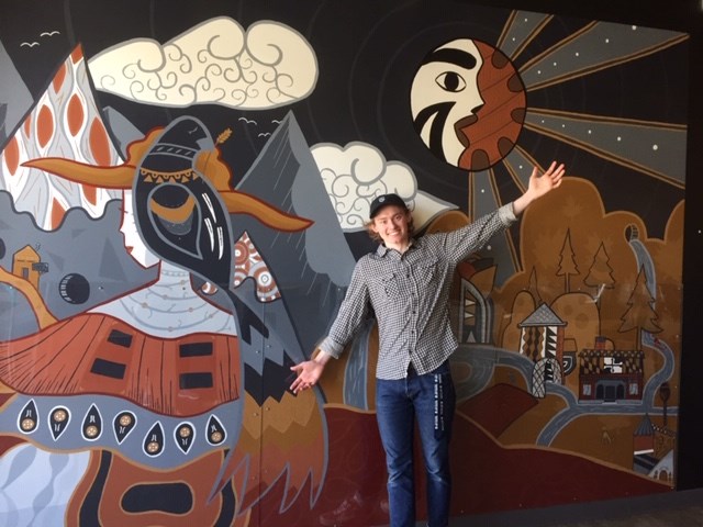 Taylor Klassen shows off the mural he recently completed at Patina Brewing Co. in Port Coquitlam.