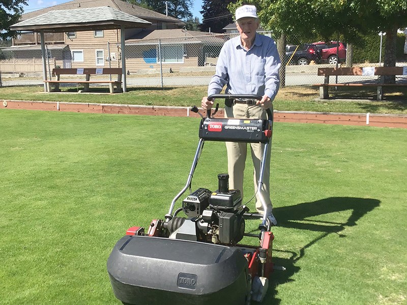 LABOUR OF LOVE: Ken Dunlop has been keeping the greens at Powell River Lawn Bowling Club in tip-top shape for decades. He is also a lifetime member. Desiray Fenrick photo