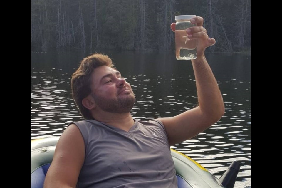 Florian Luskow with Craspedacusta, a freshwater jellyfish, at in Killarney Lake. COURTESY OF FLORIAN LUSKOW, UBC