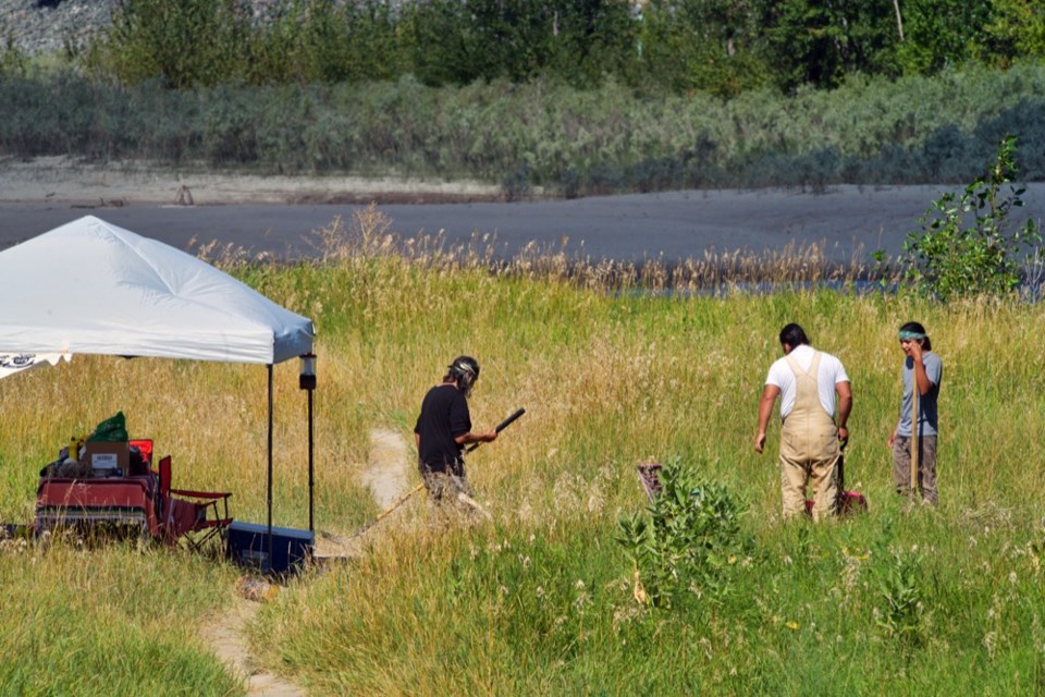 Kamloops This Week visited the site of the sacred fire on Thursday morning, where protesters have set up a canopy tent and camping tent along the bank of the river, about 500 metres from where Trans Mountain workers have set up around the Mission Flats public beach parking lot.