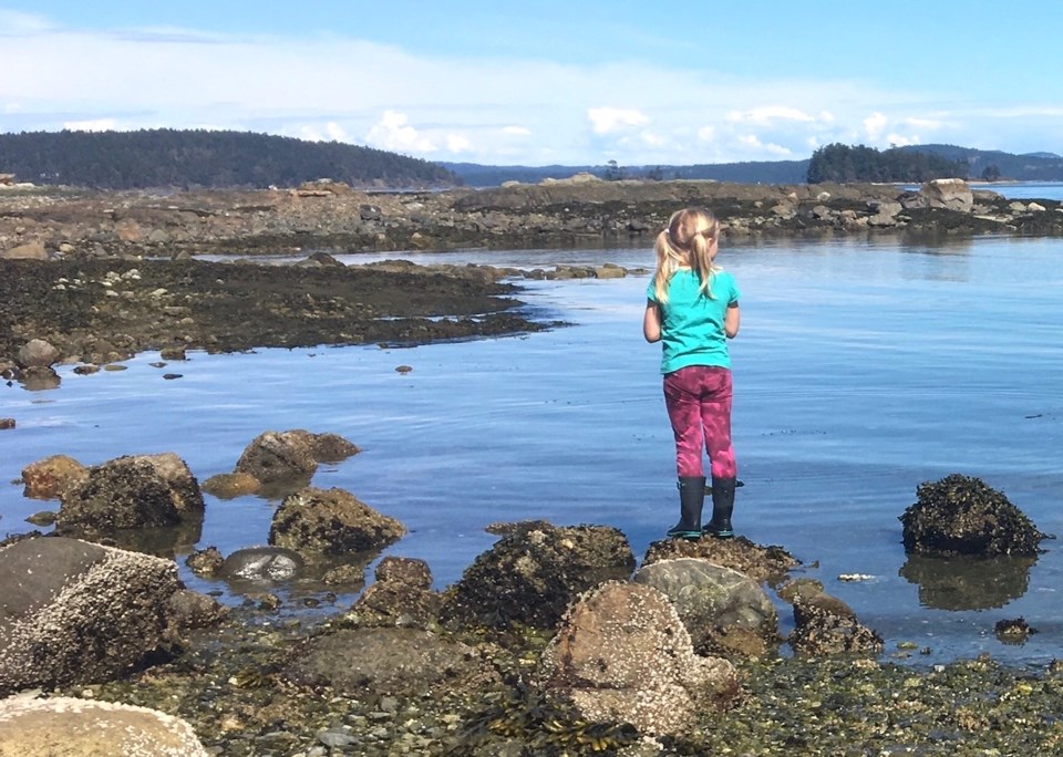 Girl looking at ocean