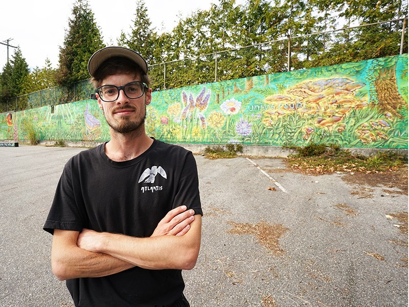 BIG AMBITIONS: Catnip the artist has painted the old foundation to the Townsite’s Walnut Lodge in bright colours, creating a mural and a small park he hopes will be appreciated by people seeking a quiet and reflective place. Paul Galinski photo