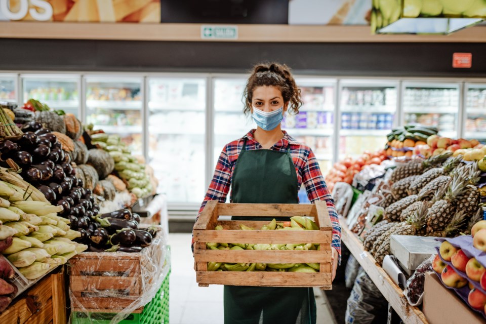 COVID-19, grocery store worker, stock photo