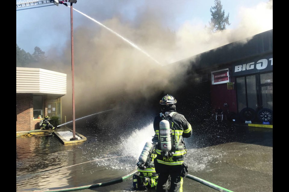 Firefighters battle a fire at Big O Tires on Tuesday. VIEW ROYAL FIRE DEPARTMENT. Sept. 8, 2020
