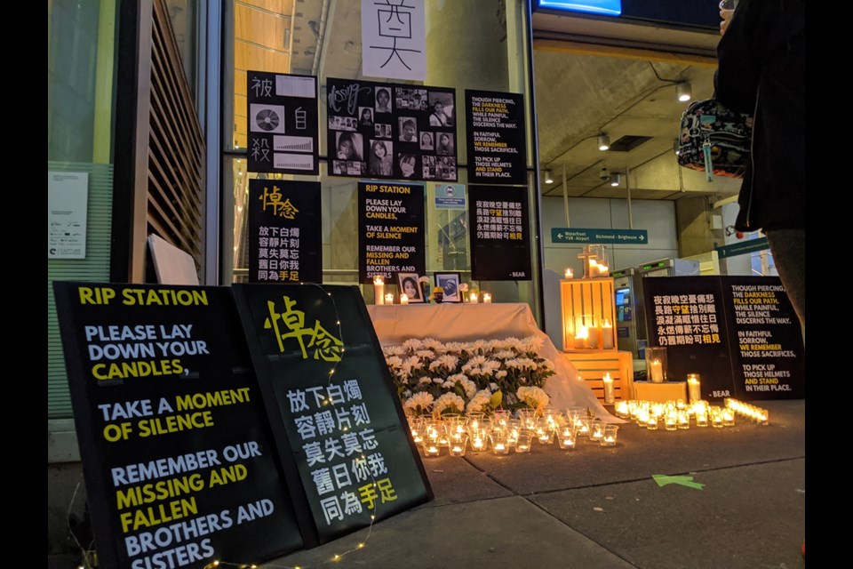 Candles were lit up at a vigil held at Aberdeen Skytrain Station on Aug. 31 in Richmond. Photo: Vancouverites Concerned About Hong Kong/ Facebook