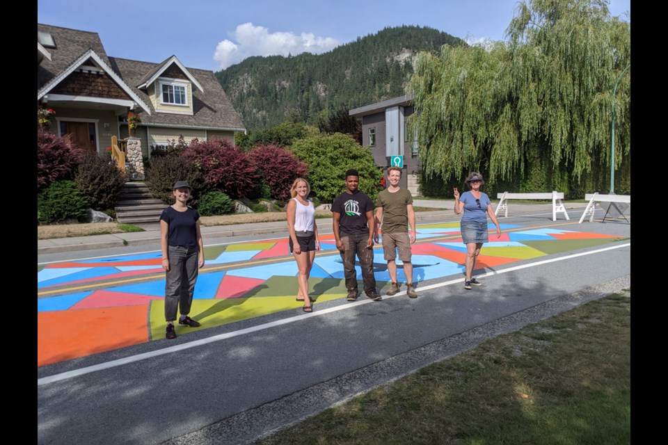 Quest student Emi Celeste far left, Glenne Campbell far right, Aidan Sutherland center. OurSquamish founders Cameron Cope centre right and Constance Wylie centre left.