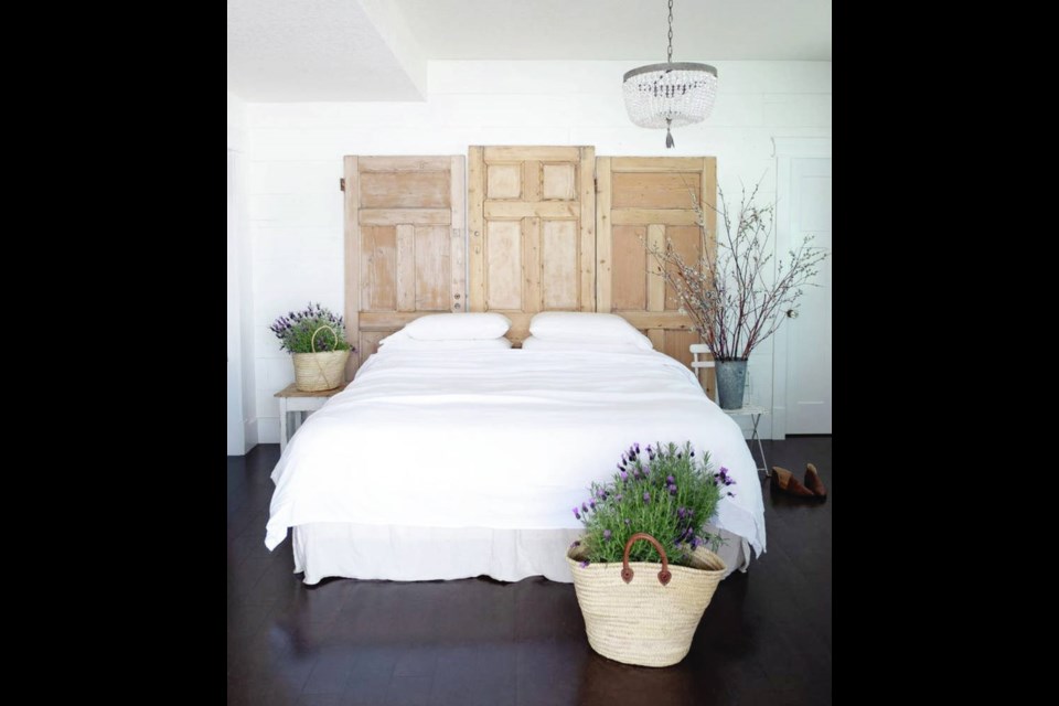 Door headboard An ingenious use for recycling old doors, this headboard invites country dreams. HOUSE TO HOME