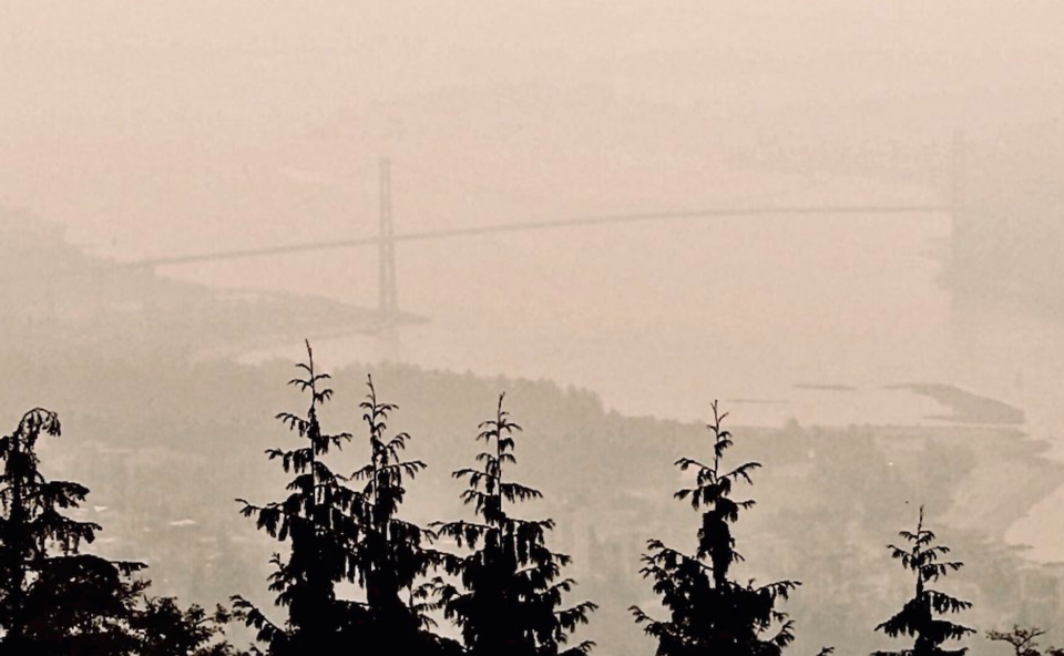 Smoke masks Lions Gate Bridge