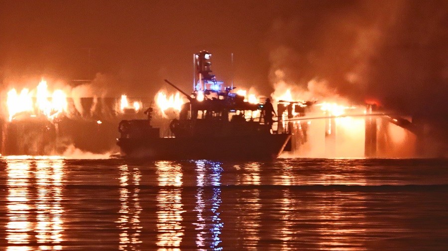 A Vancouver Fire Department boat sprays water on the fire at Westminster Pier Park. Shane MacKichan photo