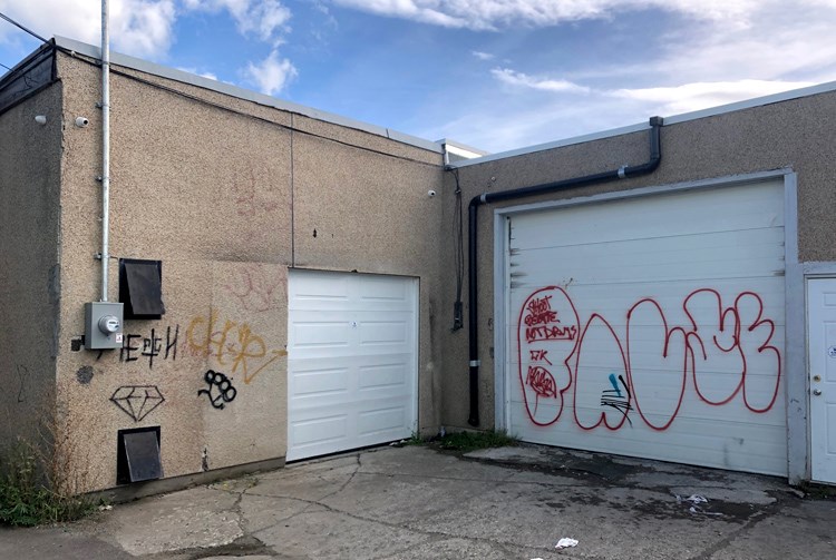 Graffiti is seen on the back of a building facing onto an alley between Second Avenue and Third Avenue downtown. An update the Regional District of Fraser-Fort George's unsightly premises bylaw prompted a debate about graffiti and freedom of expression.