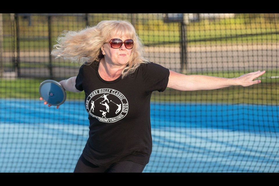 Christine Hinzmann, Citizen reporter, is seen here throwing the discus. During the Sept. 19 Cory Holly Throws Challenge held in Vernon Hinzmann broke the BC record for the weight throw and squeaked by the BC record for the Throws Pentathlon that's held strong since 2007 by Canadian record-holder Rose Hare.