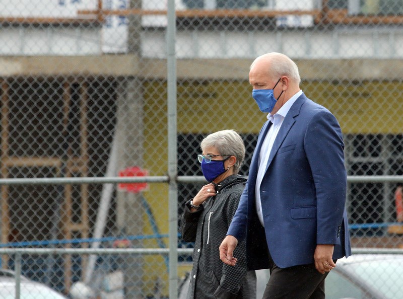 BC NDP leader John Horgan arrives for a campaign stop at the Como Lake United Church Housing Hub project with Coquitlam-Maillardville candidate Selina Robinson on Friday where he talked about affordable housing.