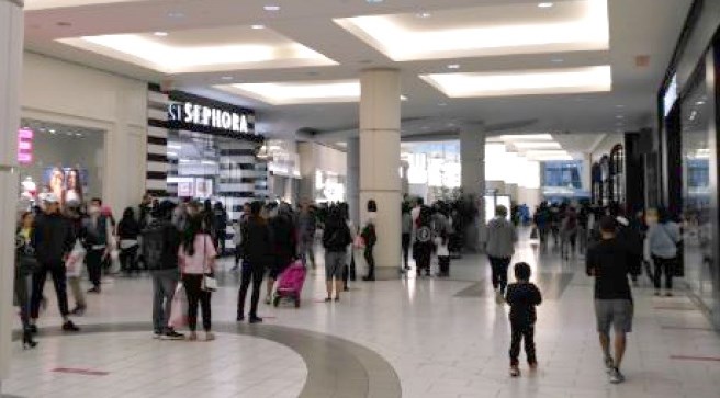 Shoppers back at Metropolis mall, Burnaby. | Burnaby Now