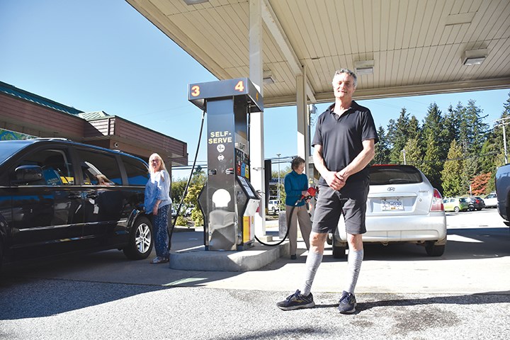 Dave Munro stands outside the Wilson Creek Shell gas station on Sept. 29, the week before his planned retirement.