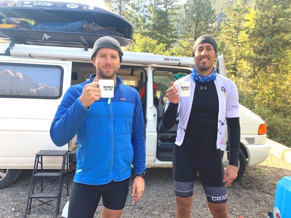 Liam Zahara and Mateo Everitt holding up Bowen Island mugs