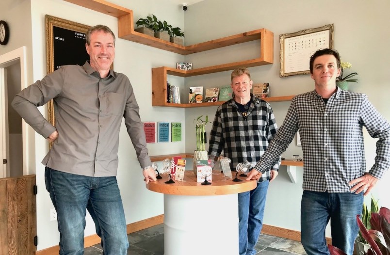 Three men in a cannabis store