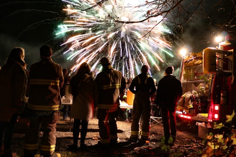 Firefighters watching fireworks